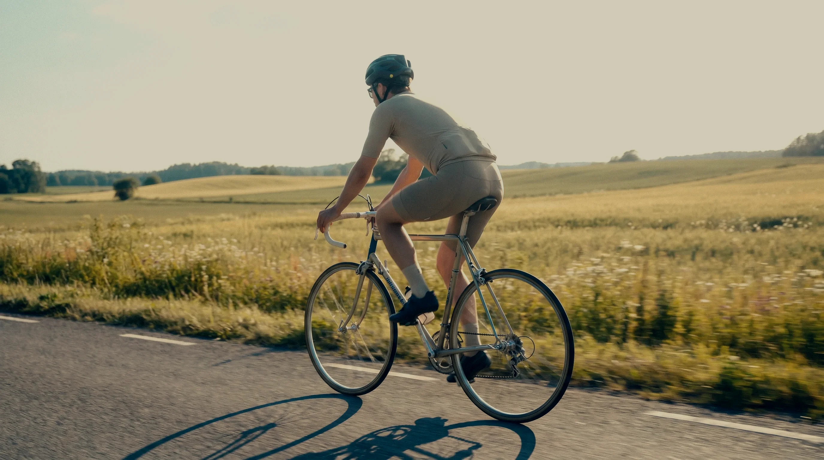 Cyclist on a quiet Nordic road