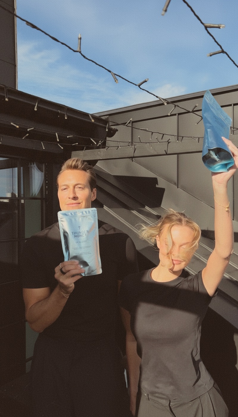 Thunder Honey founders Joakim Bjarke and Nina Strauss holding the Daylight pouch